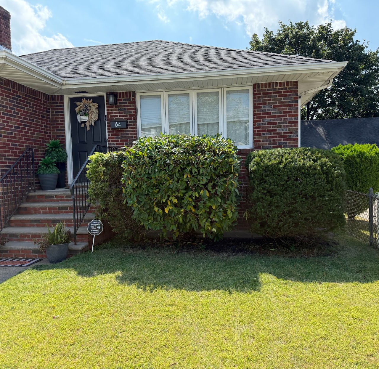 Finished residential lawn and landscaping with strong curb appeal